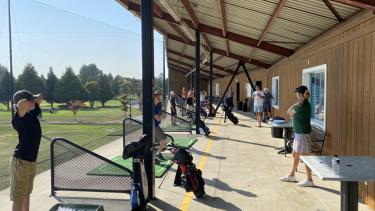 Gold Academy Students at driving range